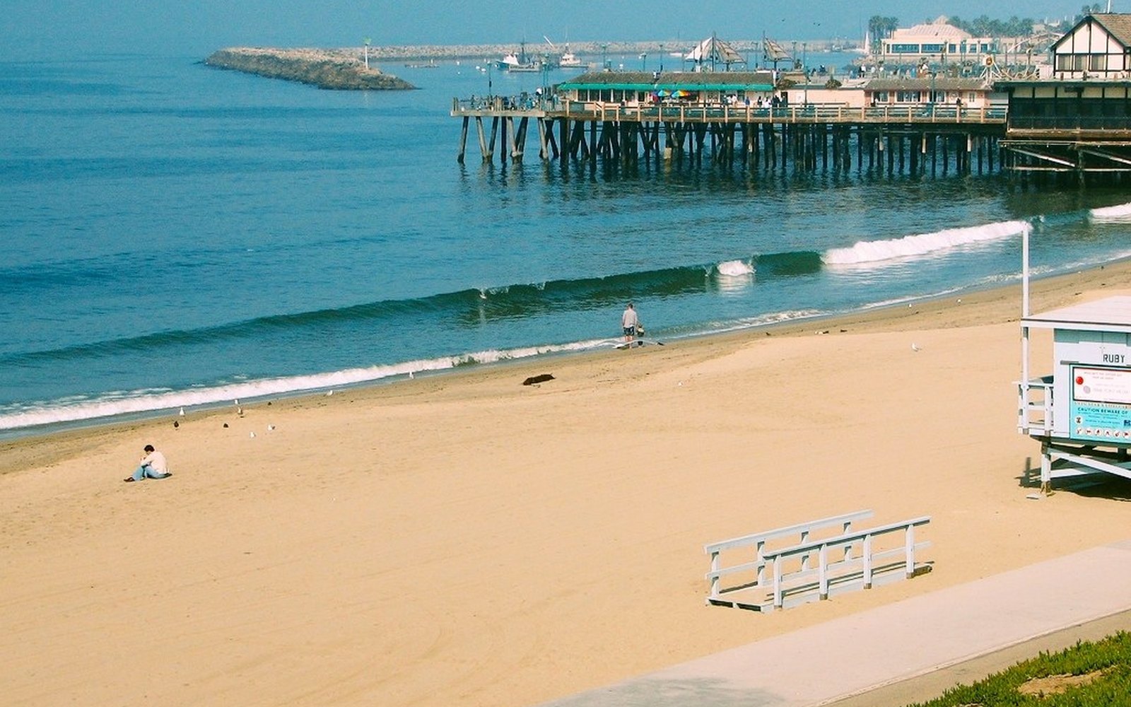 Roofing crew repairing a roof on a house in Redondo Beach, CA